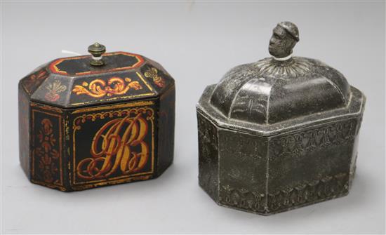 Two cast iron and lead tobacco boxes, with interior weight lids